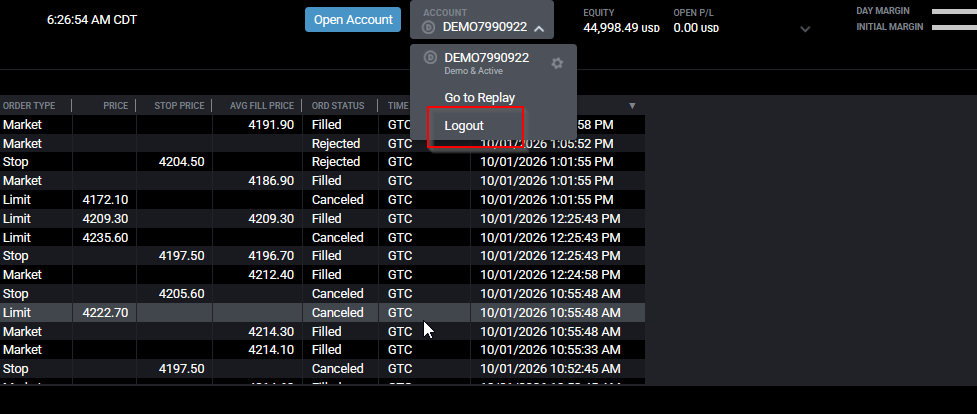 Tradovate web platform with the account menu open in the top corner showing the Logout option